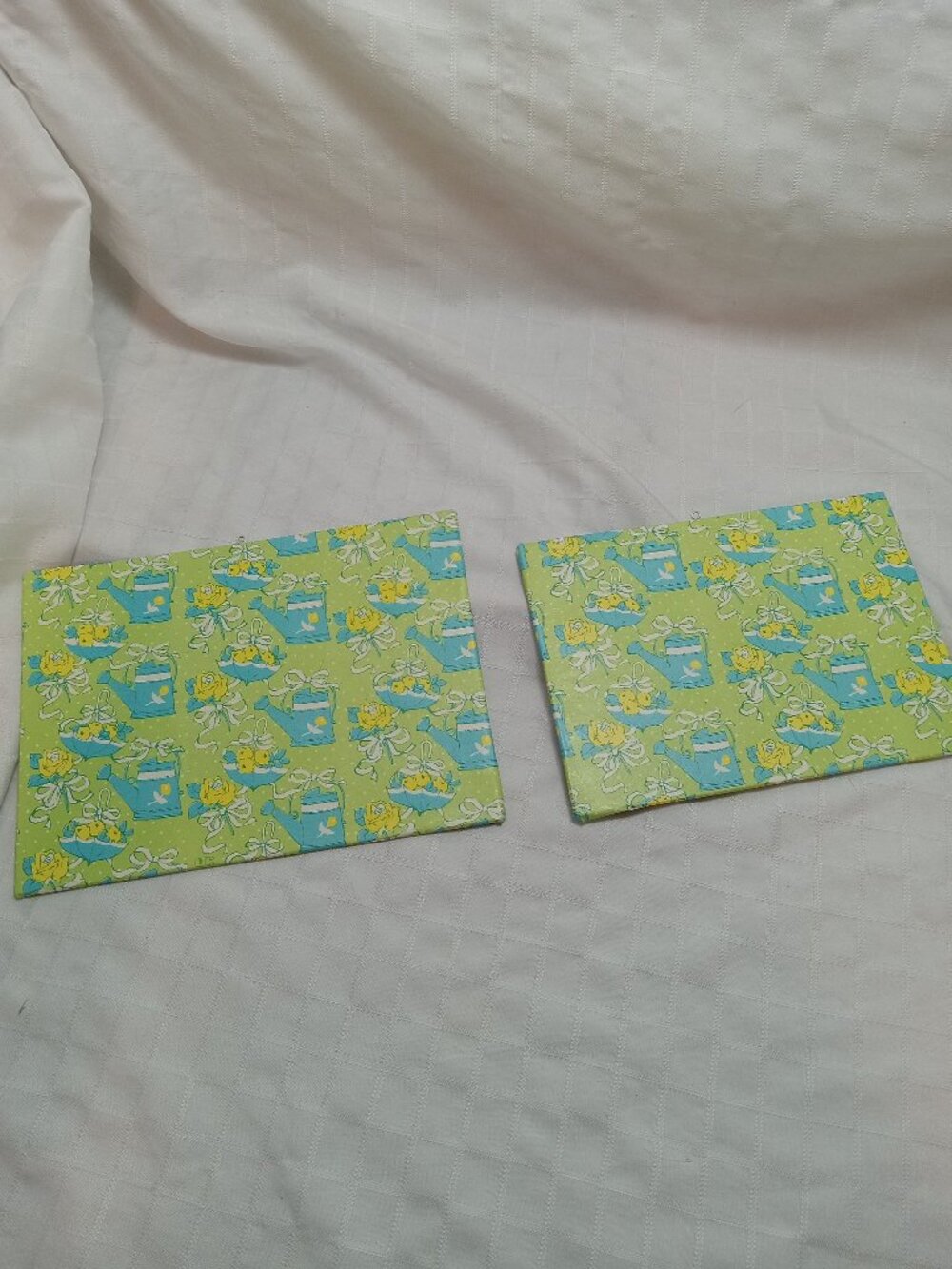 A set of handmade canvas for a baby's room, made of thin vintage wrapping paper